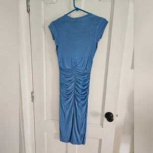 Light blue stretchy maxi dress. Size small made by Rubber Ducky Productions Inc.